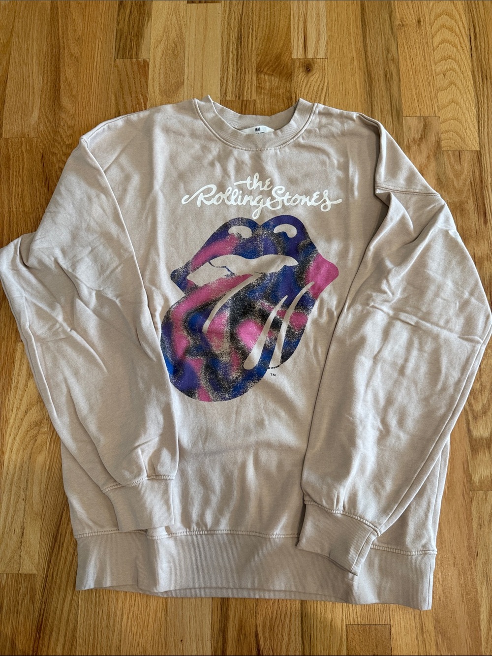 the Rolling Stones Beige Crewneck Sweatshirt with Pink and Blue Tongue Graphic